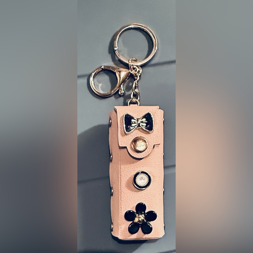 Elegant Pink Lipstick Keychain with Gold Accents. Never used.